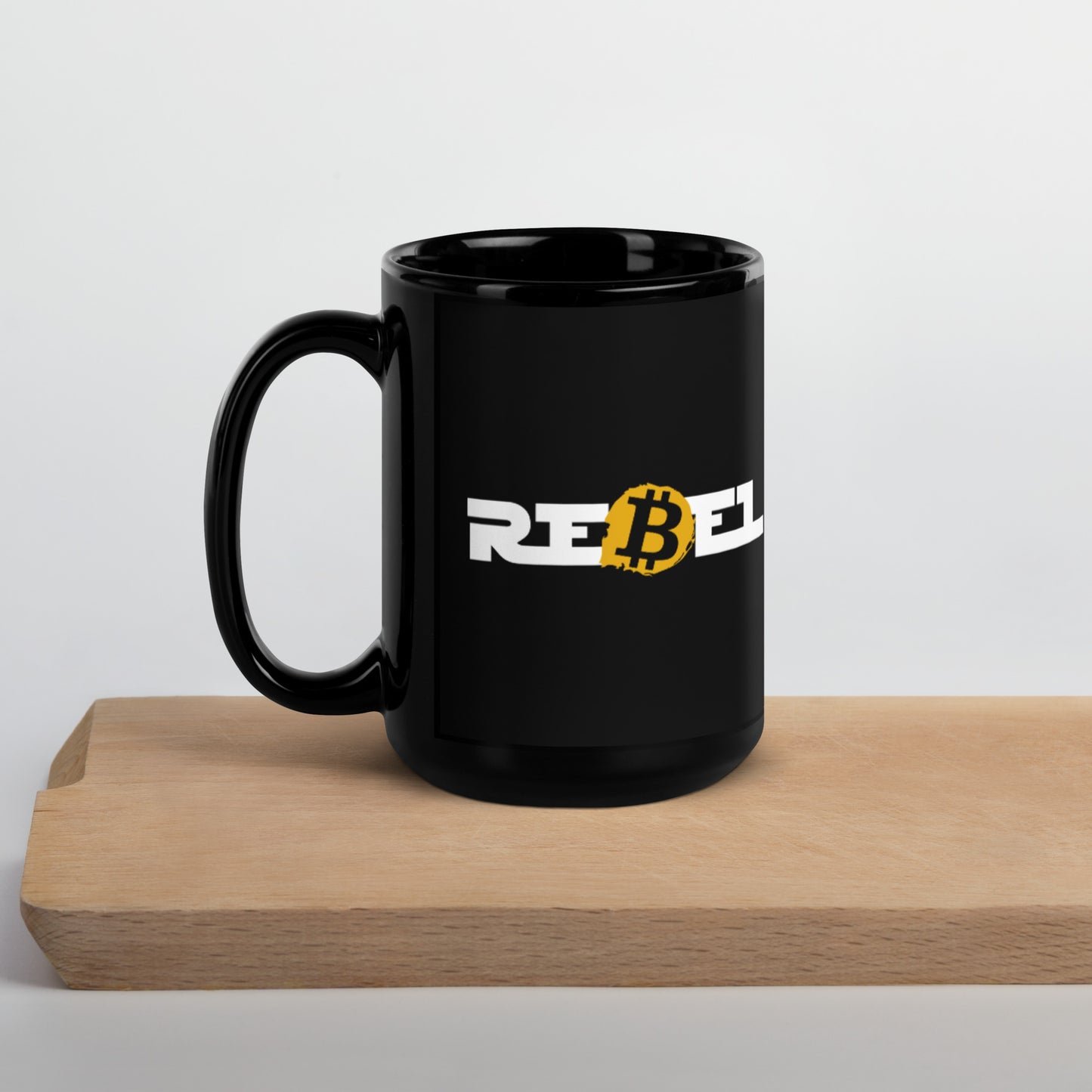Black ceramic mug with Bitcoin REBEL logo on either side