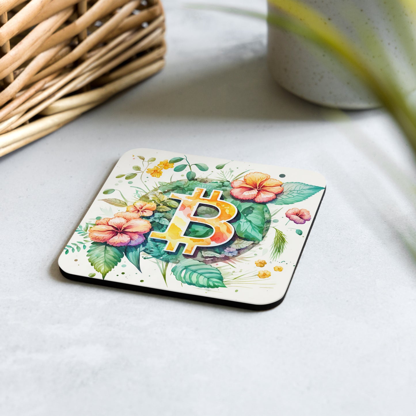 Cork back coaster with floral bitcoin logo design on white background. 