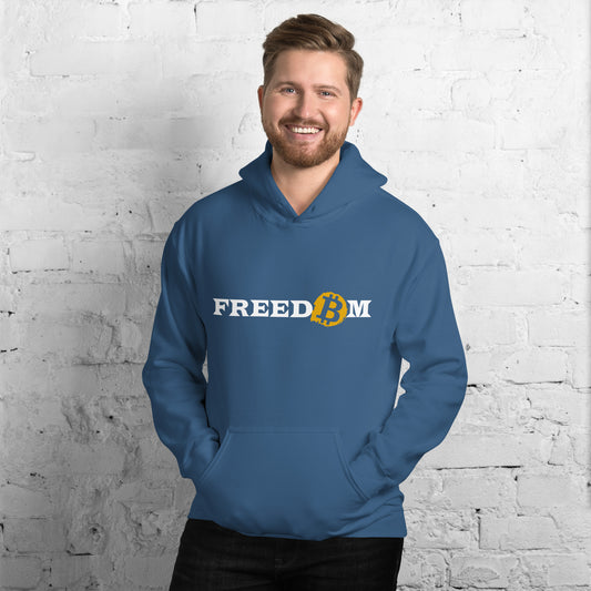 Male model wearing an indigo blue heavy blend hoodie with the word ‘Freedom’ written on it in white letters. The letter ‘o’ is replaced with the orange bitcoin logo.